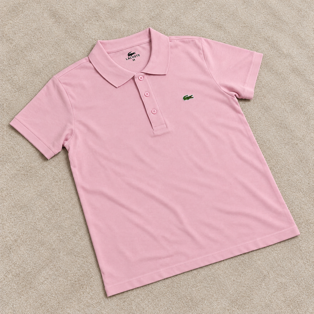 Camiseta polo Lacost rosa